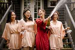 lyrebird falls luxe relaxed wedding forrest Bridesmaids in robes champagne Spray