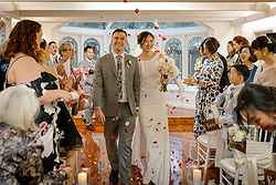 lyrebird falls luxe relaxed wedding indoor ceremony petal toss