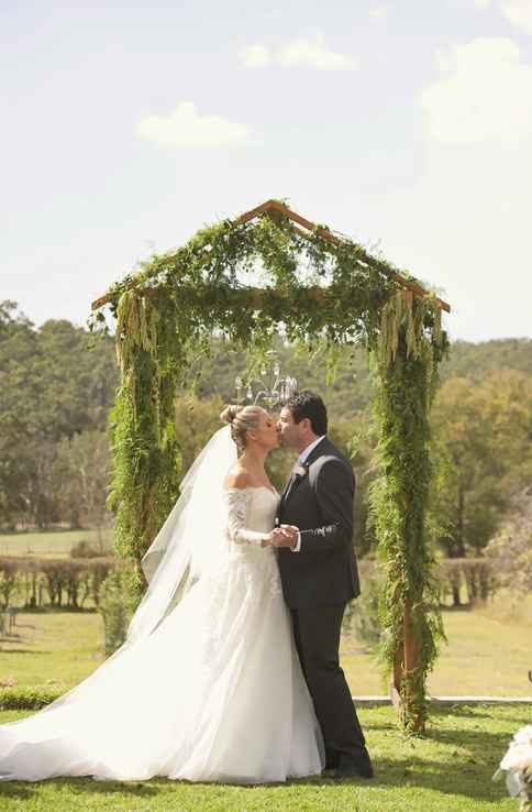 Nicole & James' Wedding Kiss at The Barn The Briars