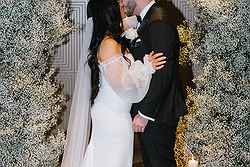 Bride and Groom Kiss - Q Events by Metropolis