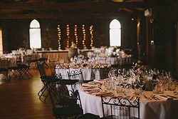 Table Setting - Roomba's Wedding Venue at Real Weddings