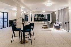 Modern lounge furniture and stylish seating arrangements at San Remo Ballroom.